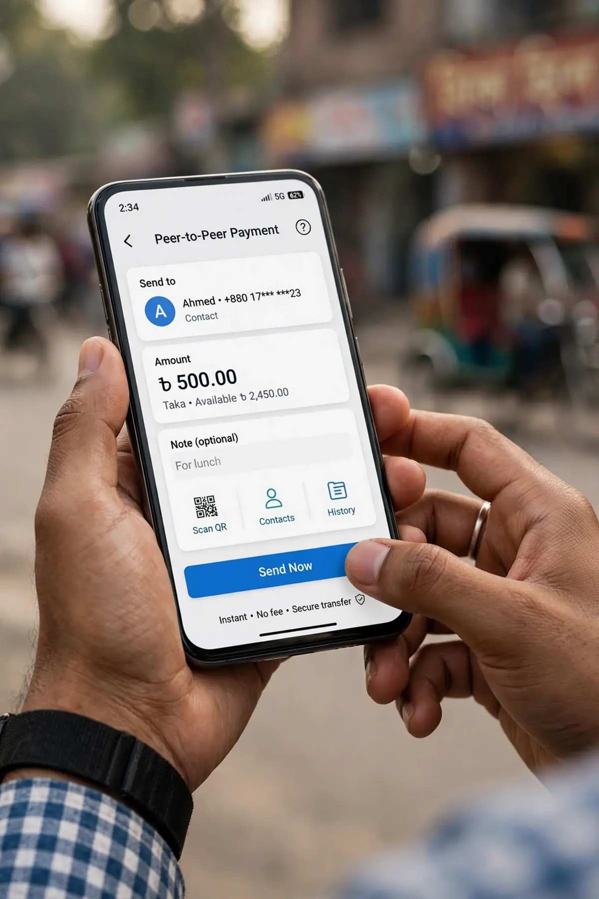A person in Bangladesh using a smartphone mobile wallet app to make a peer to peer payment