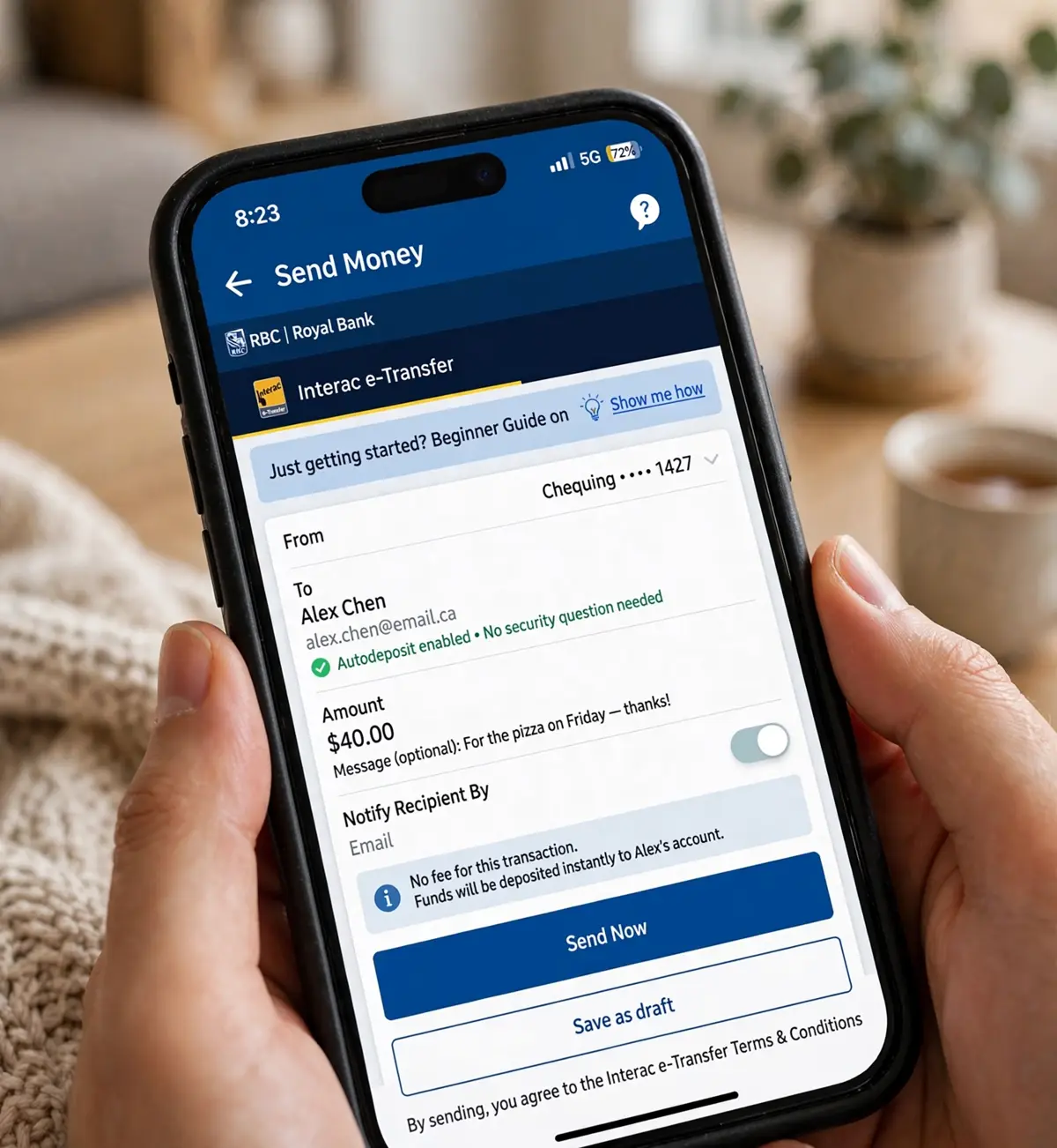 A Canadian beginner sending an Interac e-Transfer on a smartphone banking app at home